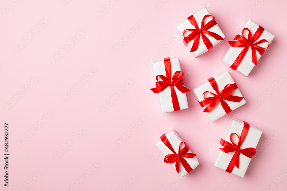 Top view of gift boxes on color background