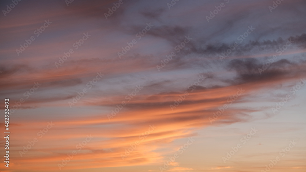 Dramatic orange gray purple sky and clouds at sunset for background, colorful dramatic sky with cloud at sunset, sky texture. sunset, evening sky, background Dramatic orange gray purple sky and clouds at sunset for background, colorful dramatic sky with cloud at sunset, sky texture. sunset, evening sky, background