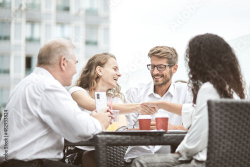 Business handshake. Business handshake and business people concept.