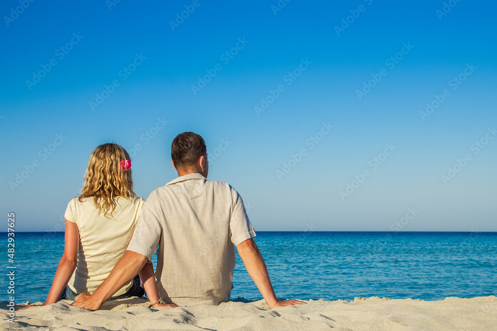 happy loving couple by the sea in the nature happy loving couple by the sea in the nature