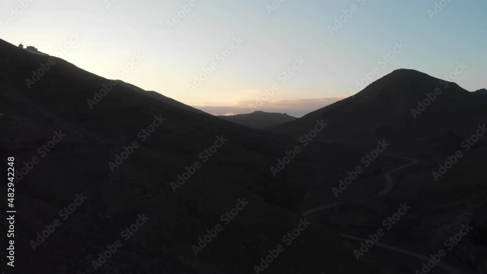 Panoramic drone aerial view at night of the volcanic mountain landscape of Fuerteventura Panoramic drone aerial view at night of the volcanic mountain landscape of Fuerteventura