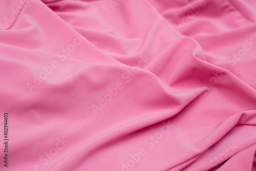 Fotografie Soft focus texture of the silk fabric, soft pink
