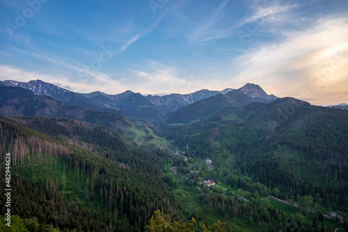 View from Nosal to Kuznice with the peaks of the Tatra Mountains in the background.