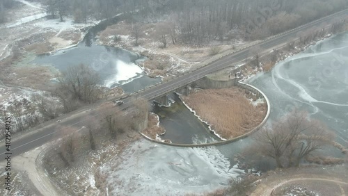 view of the bridge over the frozen river