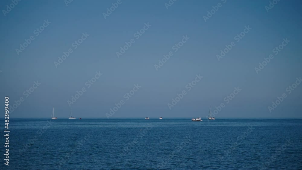 Seascape with boats on the horizon Seascape with boats on the horizon