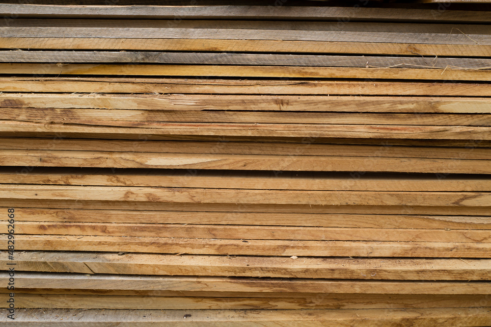 Chestnut tree wooden boards stacked Chestnut tree wooden boards stacked