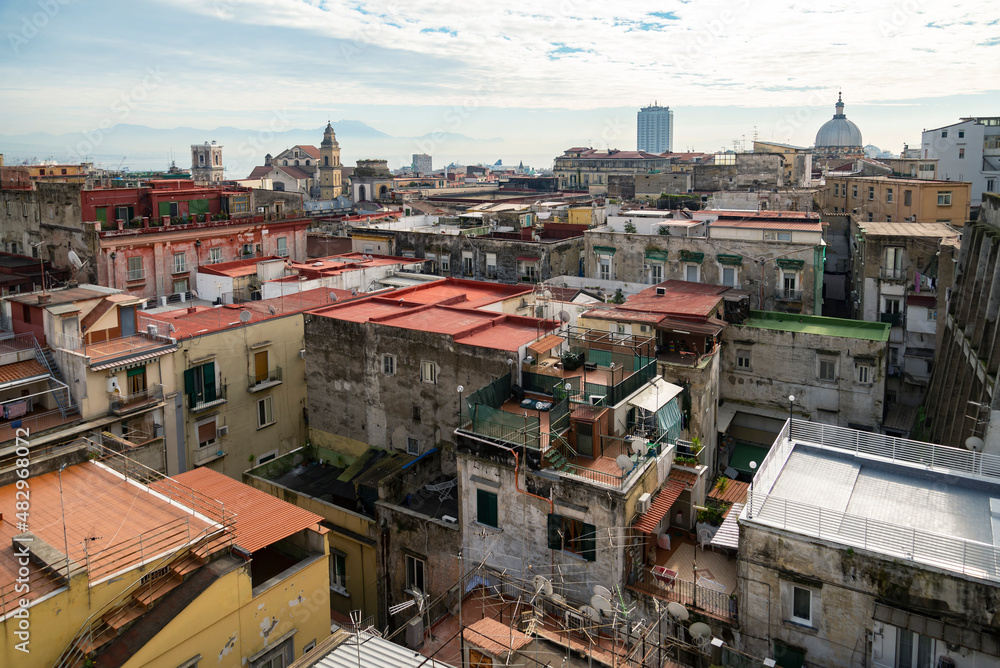 Old overcrowded apartment houses with balconies - dense living in overpopulated Napoli center, Italy