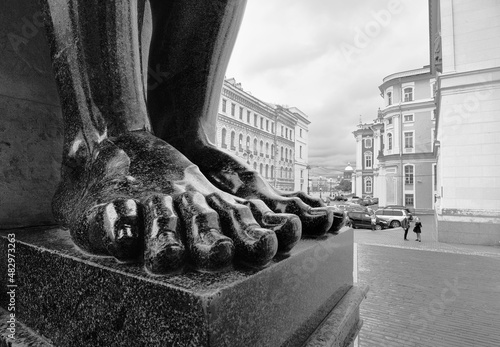 Feet of stone Atlanteans in the portico of the New Hermitage photo