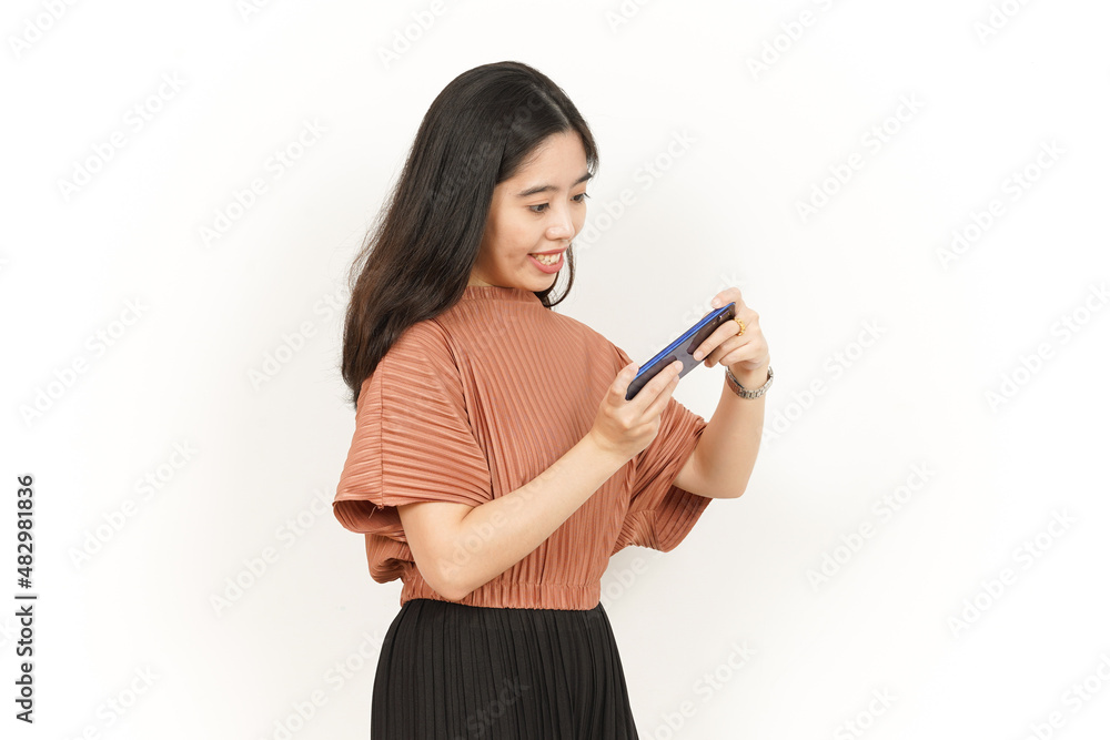 Playing Game on Smartphone Of Beautiful Asian Woman Isolated On White Background Playing Game on Smartphone Of Beautiful Asian Woman Isolated On White Background