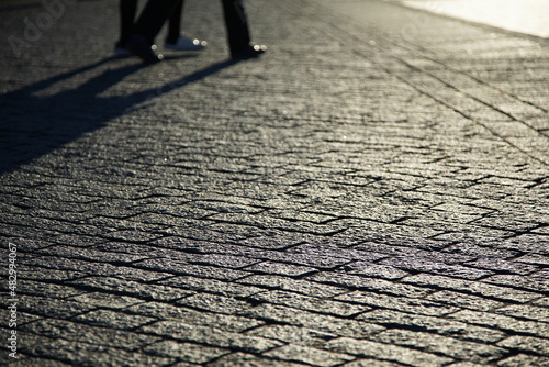 Wallpaper Mural Cobblestone sidewalks of a city street in the evening of the setting sun Torontodigital.ca