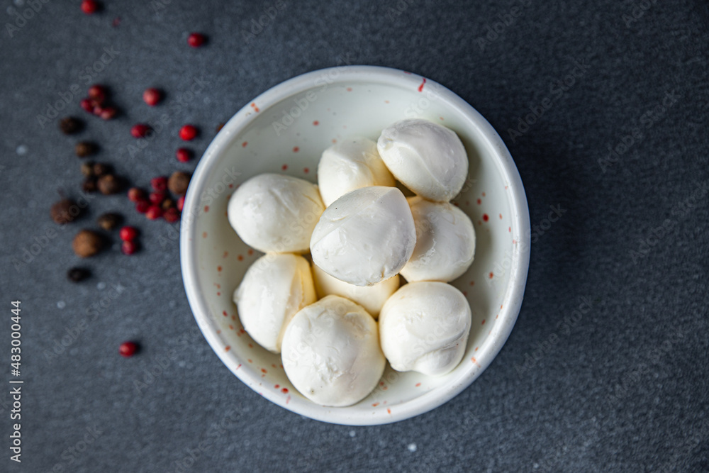 mini mozzarella cow or buffalo milk fresh portion dietary healthy meal food diet still life snack on the table copy space food background rustic top view mini mozzarella cow or buffalo milk fresh portion dietary healthy meal food diet still life snack on the table copy space food background rustic top view