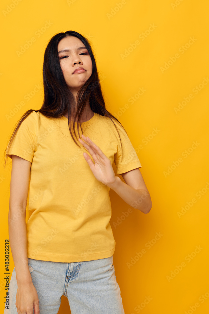 Charming young Asian woman emotions upset problems studio model unaltered Charming young Asian woman emotions upset problems studio model unaltered