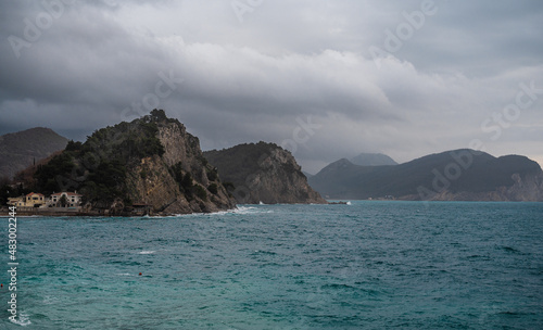 Beautiful view of the Adriatic coast on a cloudy winter day. Near the city of Petrovac  Adriatic coast of Montenegro