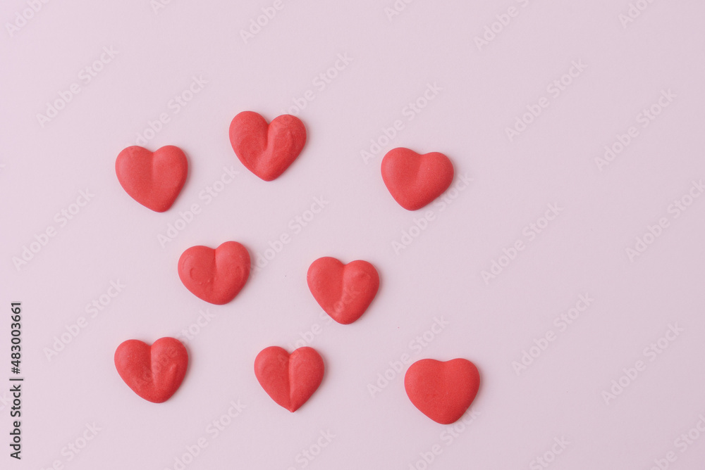 sugar hearts on pink background