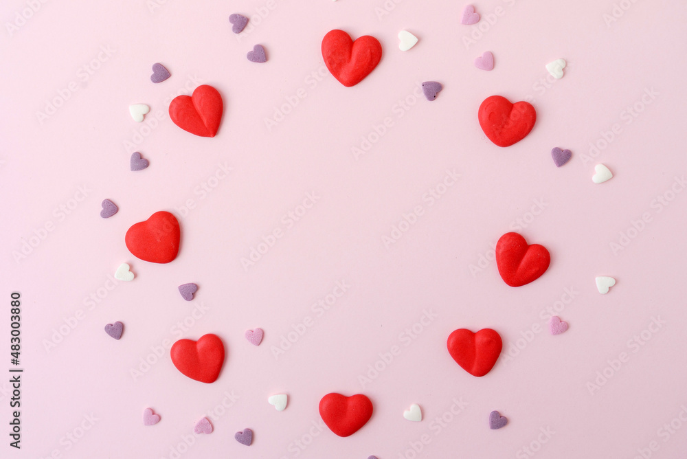 sugar hearts on pink background