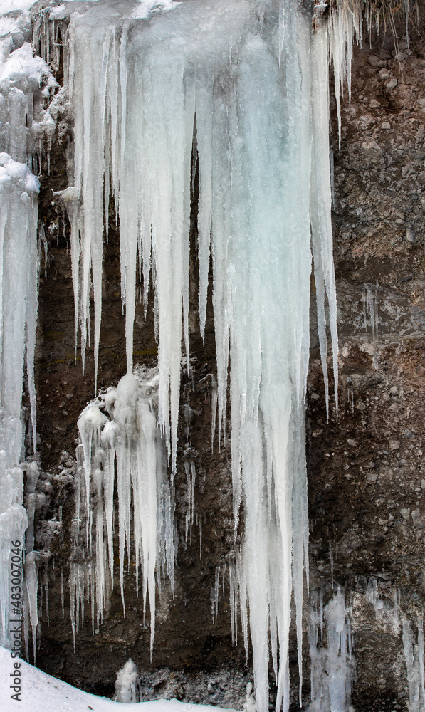 long icicles on a precipice long icicles on a precipice