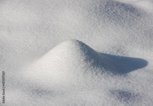 a snow dune in the foreground