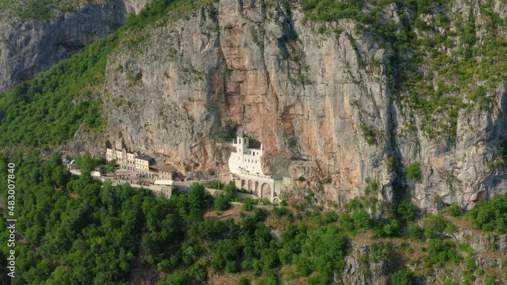 Aerial view on the Monastery of Ostrog situated vertical rocky mountain. It is dedicated to Saint Basil of Ostrog. Aerial view on the Monastery of Ostrog situated vertical rocky mountain. It is dedicated to Saint Basil of Ostrog.