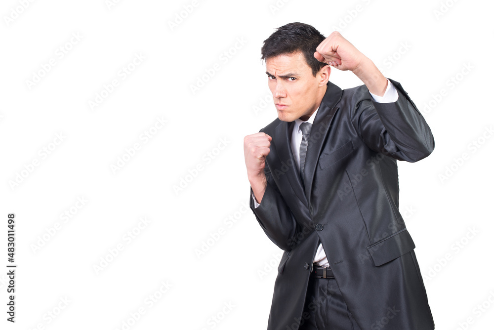 Serious worker standing in boxing stance and clenching fists Serious worker standing in boxing stance and clenching fists