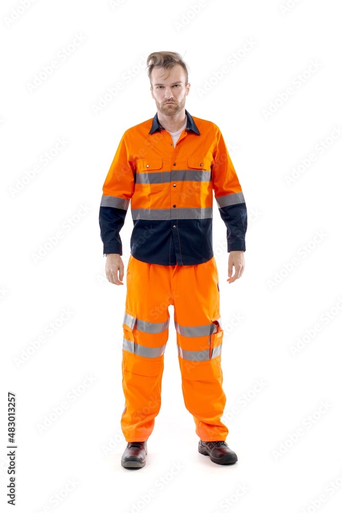 A middle-aged white man wearing an orange working uniform standing over isolated white background looks happy. Worker and builder concept. A middle-aged white man wearing an orange working uniform standing over isolated white background looks happy. Worker and builder concept.