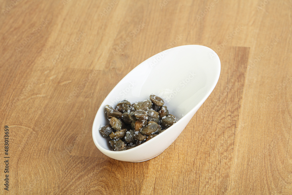 Salted marinated capers snack appetiser Salted marinated capers snack appetiser
