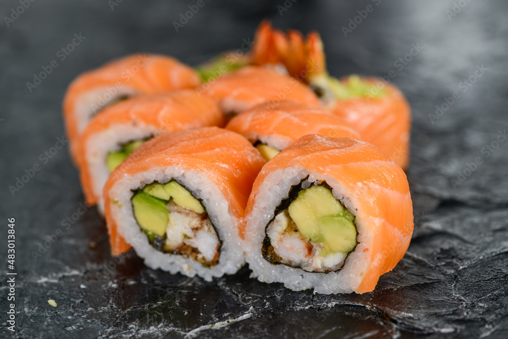 sushi rolls philadelphia original on black background
sushi rolls philadelphia original on black background