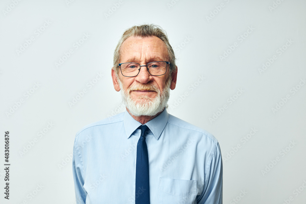 elderly man with gray beard in business office suit elderly man with gray beard in business office suit