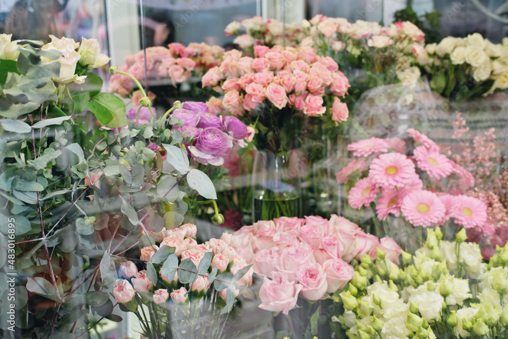 Flowers for sale in a special cold room, warehouse with air conditioning. Refrigerator for flowers. florist shop, boutique.