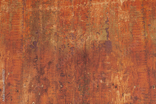Distressed Wood Texture Background. Warm colors..Rustic wood background in orange and yellow.