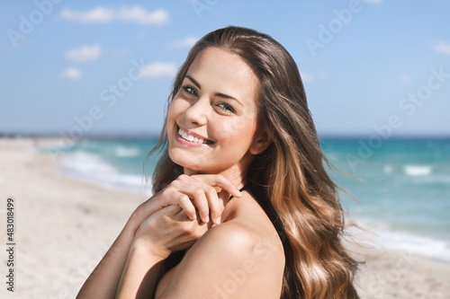 Happy woman with a beautiful face with clean fresh smooth skin.