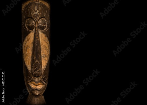 African Masks over black background