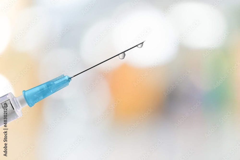 A syringe in front of the blurred background for mandatory vaccination, A syringe in front of the blurred background for mandatory vaccination,