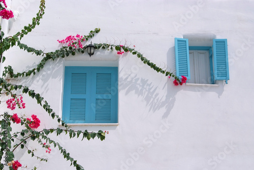  blue window on the white wall