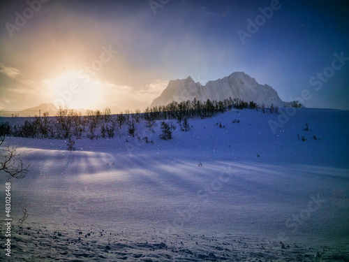The highest mountain in Senja Breitinden during snowfall
