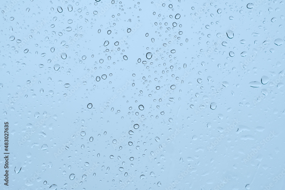 Raindrops on window, bubbles background Raindrops on window, bubbles background