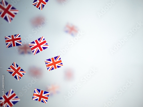 Great Britain, national holiday  country. Mini flags on a transparent foggy background. concept patriotism, pride and freedom. Platinum Jubilee of Queen Elizabeth II. photo