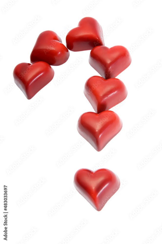 Fototapeta premium Chocolate Hearts Making Question Mark on White