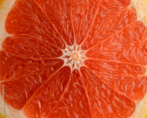 Fresh sliced grapefruit. Selective focus.