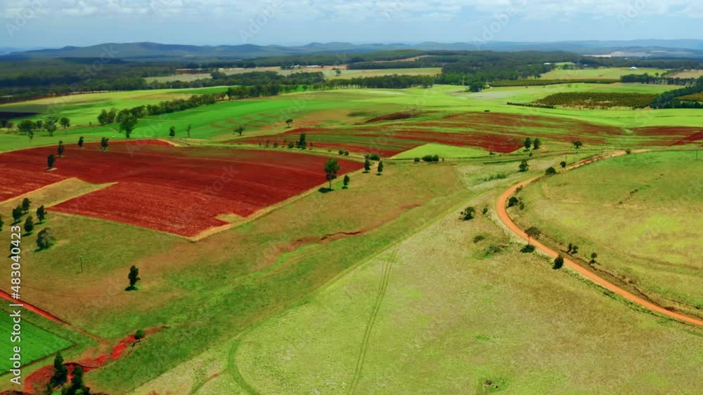Aerial View Of Colorful Farm Fields In Atherton Tablelands, Queensland, Australia - drone shot Aerial View Of Colorful Farm Fields In Atherton Tablelands, Queensland, Australia - drone shot