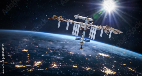Fotografie, Obraz International space station in 2022 in outer space with Earth at night