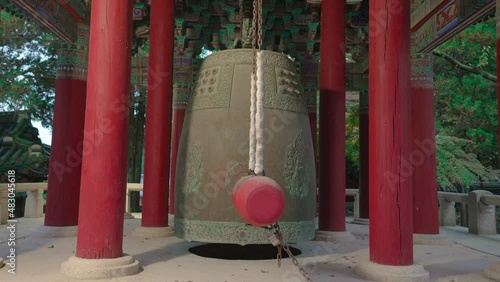 Gyeongju, South Korea - Nov 2021: Tourist visit to Bulguksa temple in Gueongju, South Korea. Bulguksa temple is a UNESCO World Heritage site. And there is an bell called Beomjonggak photo