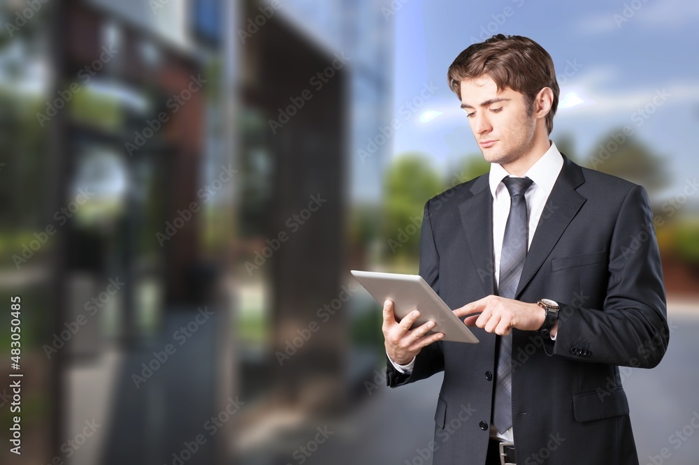 Portrait of successful business people working, in urban background. Portrait of successful business people working, in urban background.
