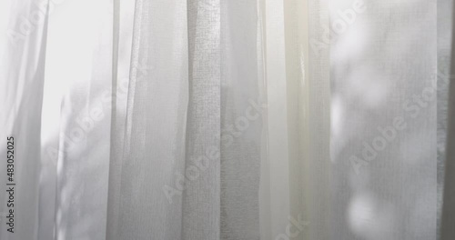 4K video slow motion of curtain in the wind. Concept for cozy and modern residential house.