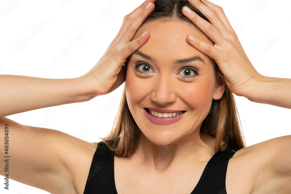 Fototapeta premium Surprised excited young woman