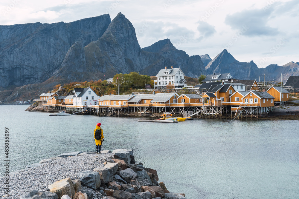 Tourist visiting lofoten villages in Norway