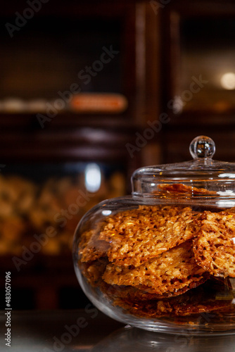 Jar with sweets made with honey and almonds
