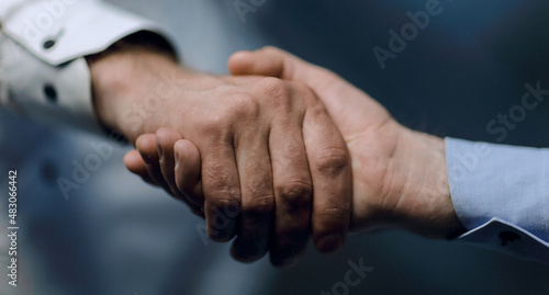 close up.confident handshake of business people