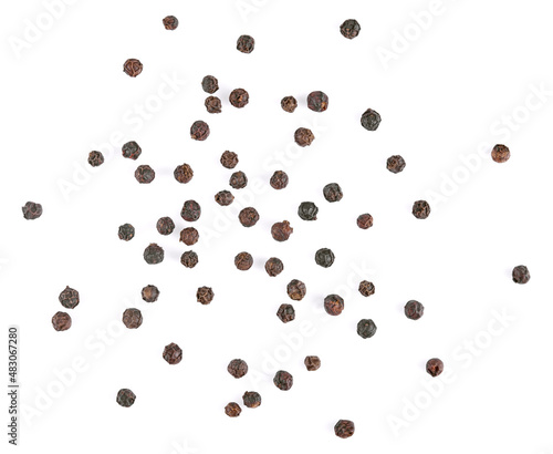 Black pepper corns Scattered on white background