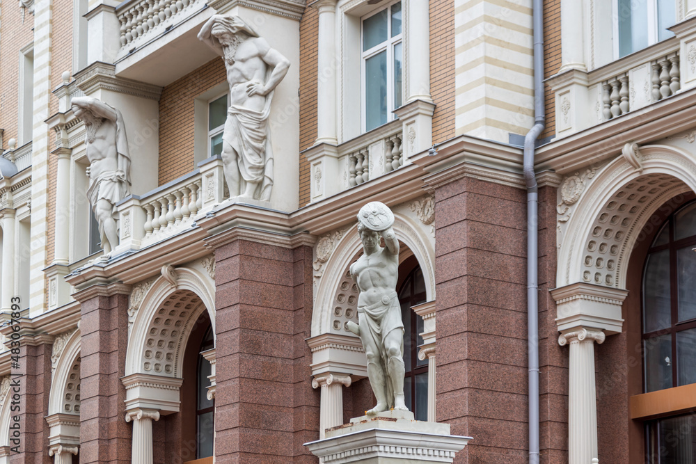 Facade of building decorated with copies of ancient sculptures in Kazan, Russia