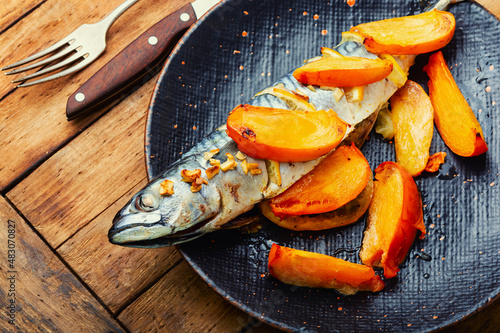 Baked fish with persimmon.